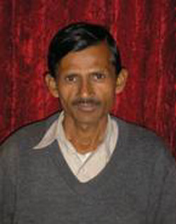 Image of MEET THE COOK - Mohamad Aslam prepared this Mash Daal recipe for CRS staff during the 2005 earthquake relief effort in Pakistan. (Photo CRS)

