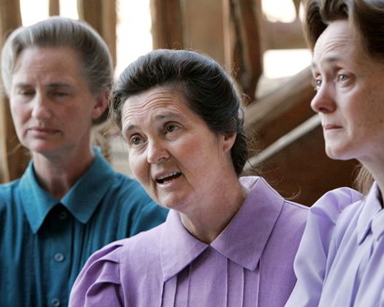 Image of Sally, left, and two other members of the FLDS, a polygamist sect, talk with reporters about the custody battle for their children. DNA tests are currently underway to help determine which child actually belongs to which mother.