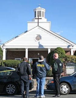 Image of Nov. 23: Clifton police investigate a triple shooting at St. Thomas Syrian Orthodox Knanaya Church in Clifton, N.J. A gunman opened fire where some 200 people were attending services inside the Asian-Indian church.