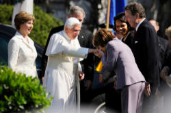 Image of When Pope Benedict XVI visited the United States, the Speaker of the House was pleased to greet him and use the public gesture of kissing his ring, a sign of respect for his office. She has regularly called herself an 