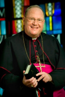Image of This gregarious, dynamic Bishop began his last assignment of leading the Archdiocese of Milwaukee in June of 2002. He did so by proclaiming those wonderful words of the late Servant of God John Paul II, the words of the Angel to Our Lady, 