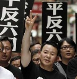 Image of The march wound its way from Victoria Park to government offices and was opened by a group of 20 young people born in ’89.  In this way the Hong Kong Alliance in Support of Patriotic Democratic Movements in China, that organises the commemoration every June 4th, wanted to underline the continuity of the event.  Among the slogans shouted during the march; 'Pass the torch on, relay the message of democracy to those who come after us'.