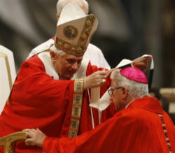 Image of The pallium, worn by the Pope and archbishops, symbolizes the lost sheep that is found again, carried on the shoulders of the Good Shepherd, and the Lamb crucified for the salvation of humanity.