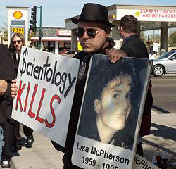 Image of Protestor outside of a scientology center. In the second installment of a three-part series on Scientology, new light has been shed on the death of Lisa McPherson, who worked for a company owned by fellow Scientologists.