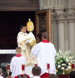 Image of The Knights leading the faithful to Adore the Eucharistic Lord on the Feast of Corpus Christi.