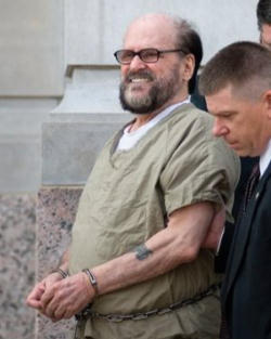 Image of Tony Alamo under arrest.