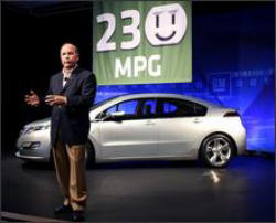 Image of GM CEO Fritz Henderson unveiling the Chevrolet Volt.