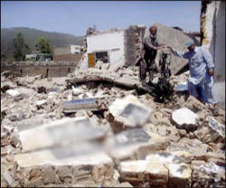 Image of The devastation where homes once stood as militant Muslims attack Christians in Pakistan.