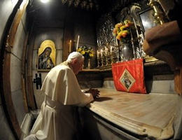 Image of A Vatican handout picture of Pope Benedict XVI praying at the tomb of Jesus inside the Church of the Holy Sepulchre in Jerusalem in May. Pope Benedict XVI is planning to summon a special synod of bishops to discuss the Middle East in October next year, the Vatican said in a statement.