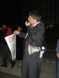 Image of Randall Terry, founder of Operation Rescue and pro-life activist, stood with his bullhorn Saturday evening outside the Washington Convention Center and challenged the crowd to stop killing babies. 