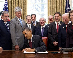 Image of The President signing the Executive Order which received little or no Press coverage.