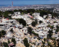 Image of Father Chávez noted how the poverty of Haiti -- it was the poorest country of the Western world even before the Jan. 12 catastrophe -- worsened the destruction and death.
