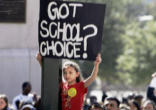 Image of ADF attorneys argue that the program--which allows state residents to claim a tax credit for donations to private organizations that provide scholarships to private schools--is constitutional because it involves individual, private choices and funding, not government action or money.