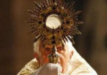 Image of Pope Benedict XVI processed with the Exposed Blessed Sacrament into the crowd of pilgrims, imparting a blessing and praying for graces of healing, consolation and mercy.