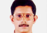 Image of Prof TJ Joseph (pictured, a 'Wanted' poster calling for his capture) has been a college lecturer since 1985.