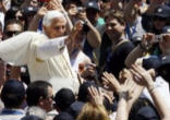 Image of Pope Benedict XVI in a crowd of the lay faithful