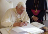 Image of Pope Benedict XVI Signing Letter