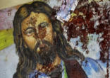 Image of An Image of the Savior, Jesus Christ, from inside the Coptic Church, covered with the blood of the innocents killed by terrorists 