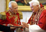Image of Grand Master of the Knights of malta greeting Pope Benedict XVI upon his visit to Malta