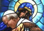 Image of Blessed Pope John Paul entrusted himself to the arms of the Blessed Virgin Mary with the words of his motto 