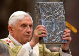 Image of Pope Benedict XVI carrying the Book of the Gospels