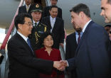 Image of Russian Culture Minister, Alexander Avdeyev greets Chinese President Hu on his arrival in Moscow, Russia, June 15, 2011.