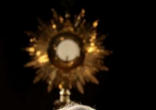 Image of Pope Benedict XVI regularly adores the Eucharist and calls the faithful into this kind of intimate communion with the Lord