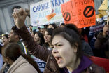 Image of Latino activists are waiting to see Obama make long-sought immigration reforms. 