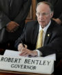Image of Alabama Gov. Robert Bentley (R) signed Alabama's new immigration law in June.
