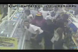 Image of Surveillance video captures some of the gang who robbed a Maryland convenience store on Saturday. Authorities believed the crime was organized via social media.