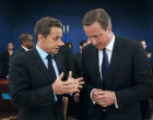 Image of French President Sarkozy and British Prime Minister Cameron.
