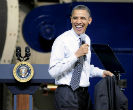Image of Obama can smile that he's not the CEO of a major corporation, and instead only the President of a world superpower.