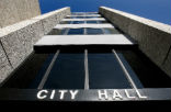 Image of City hall is making more cuts as the recession grinds on.