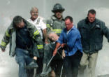 Image of Fr. Mychal Judge's body being carried out of the rubble of the Towers on 9/11/01 