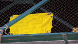 Image of The note left with the bodies as a warning to others. 