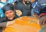 Image of More than 20 thousand people attended the funerals of 17 of the 25 victims killed in clashes between Coptic Christian demonstrators and the army 