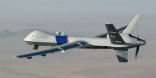 Image of A predator drone belonging to US Customs and Enforcement operates over Mexico.