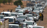 Image of Residents of Sirte fleeing in their cars during the cease-fire.