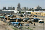 Image of A homeless encampment, not in the Third World, but in Fresno, California.
