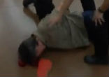 Image of Jerald Newman unconscious on floor of Walmart. Photo from Phoenix New Times