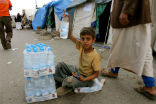 Image of Clean drinking water is a precious commodity in Sana'a, Yemen where is it sold on the streets for relatively high prices.