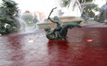 Image of Recently, protesters dyed seven fountains throughout the city the color of blood.