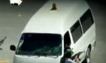 Image of This still image from a video shows Syrian security officials using a hijacked ambulance in their brazen attack on protesters.