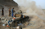 Image of Yemeni soldiers fight from a fixed position in a recent clash with Al Qaeda fighters. 