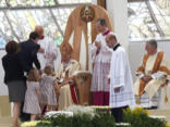 Image of Pope greets a family in Milan