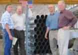 Image of Shown here, from left to right, are James Newland, Andrew Newland, Paul Newland and William Newland. William, Paul and James, plus their sister Christine, own Hercules. Andrew, William's son, is vice president of the family business