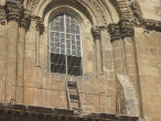 Image of Fights over seemingly trivial issues are part of the reason why this ladder hasn't moved in 255 years and a Muslim is entrusted with the keys to the door. 