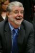 Image of George Lucas has about 4 billion reasons to be happy. 