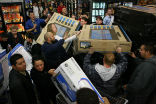 Image of Black Friday shopping, doesn't appear very uplifting for people, but scripture has the cure.