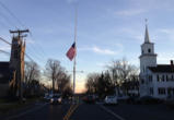 Image of Flag in Newtown reflects our National vigil